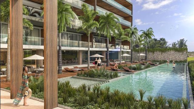 comfortable 4-bedroom condo in Puerto Canc&uacute;n. 