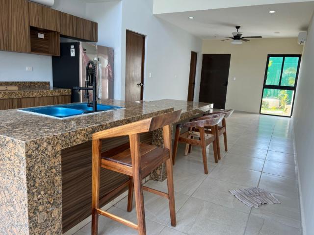 Two-bedroom townhouse with a pool in Chelem