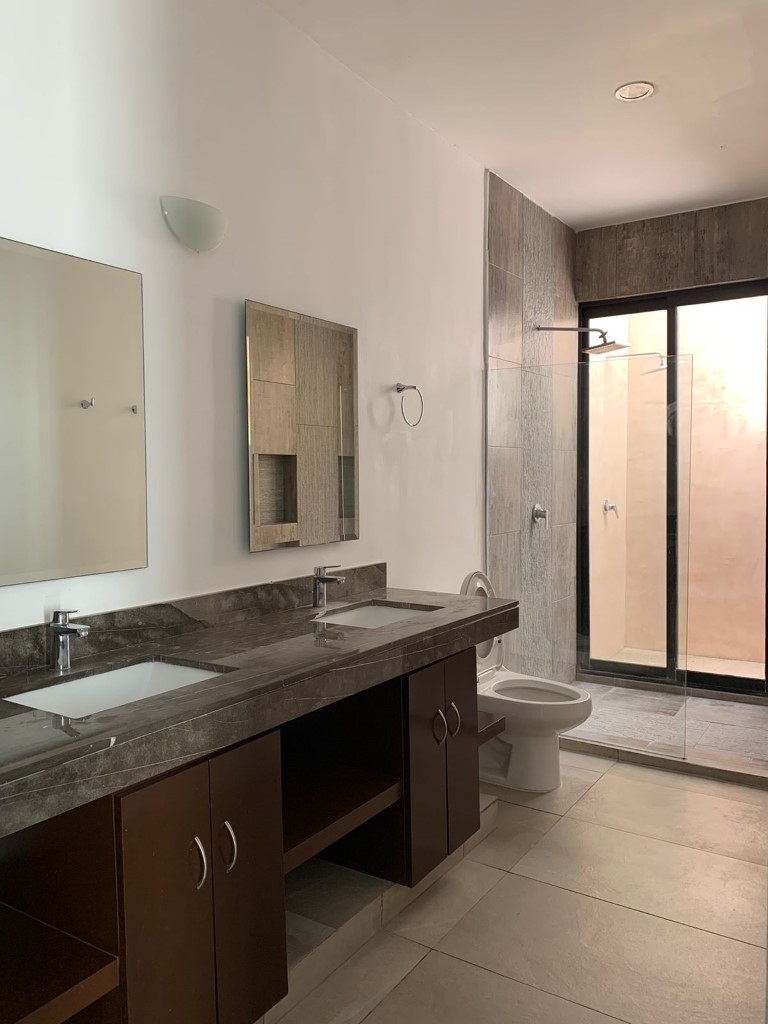 Two-bedroom house for resale within a private community