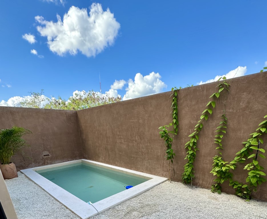 Two-bedroom condo in Mérida within a gated community
