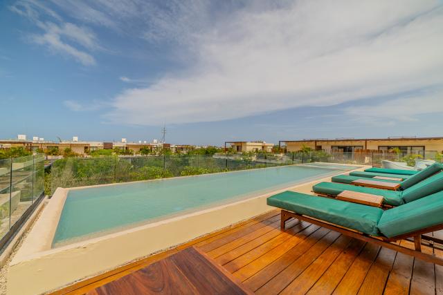 Elegant 3-Bedroom Penthouse with Private Rooftop and Pool