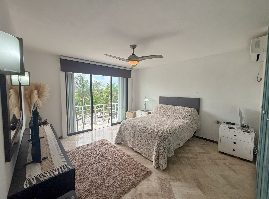 Duplex condo in the Cancun Hotel Zone with dock and pool